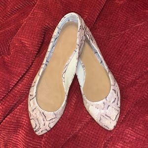 Snake print slip ons